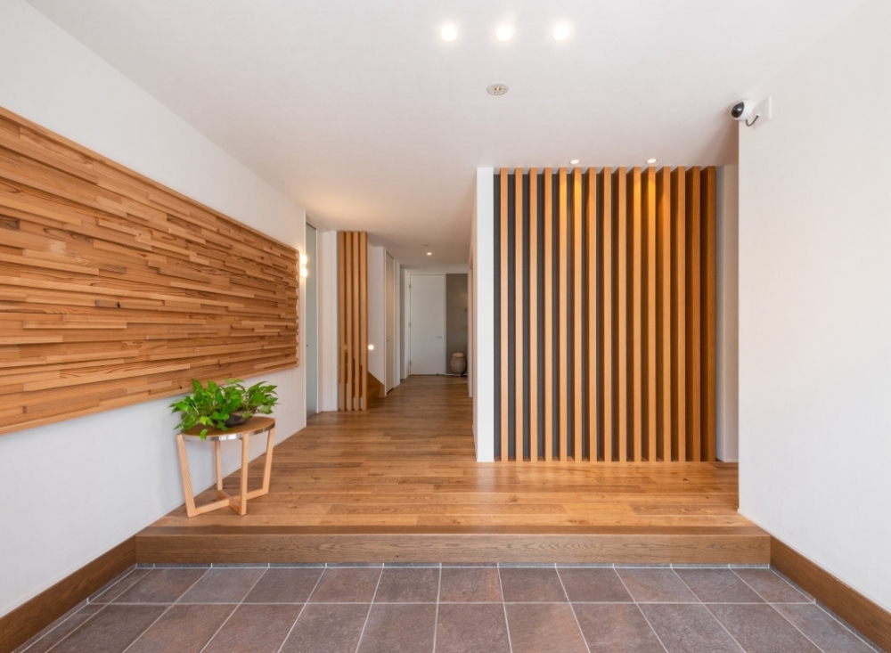 広島県広島市商工センター内にあるちゅーピー展示場　玄関 アキュラホームは、住み心地の良い家事導線・飽きの来ない間取りデザインの提案を得意としている注文住宅の木造住宅会社です。